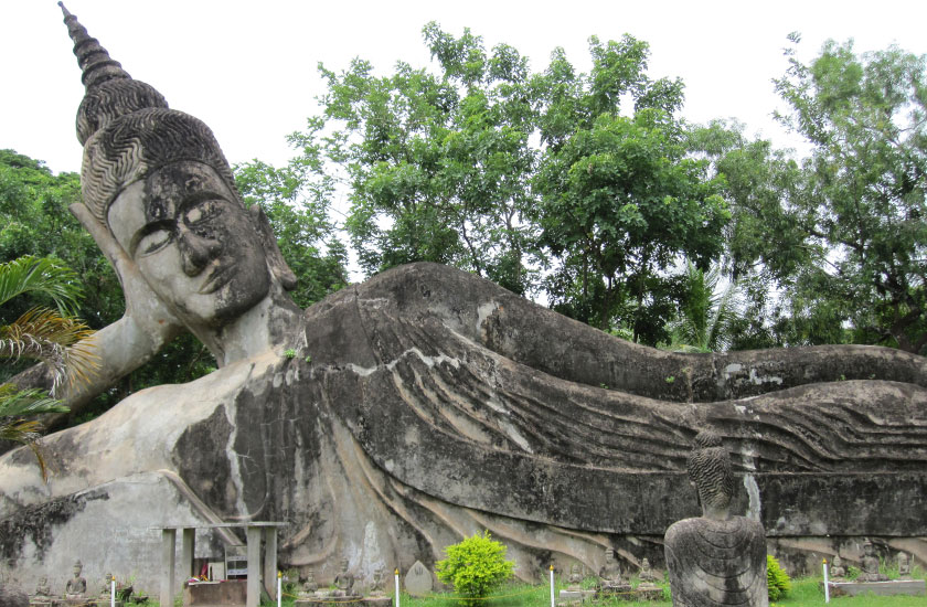 Top attraction Sleeping Buddha statue at Buddha Park in Vientiane Laos