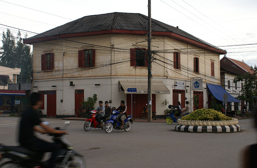 Luang Prabang Town Lao locals riding scooters/motorbikes