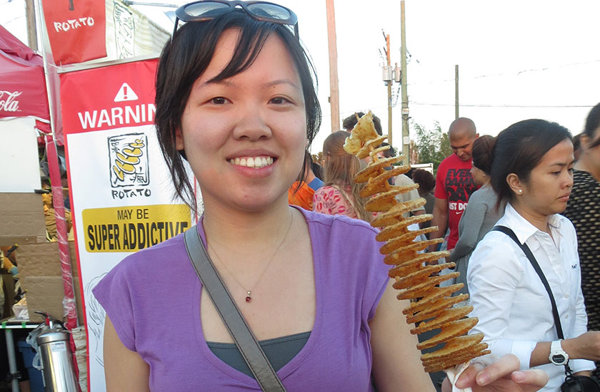 Eating potato snacks at Richmond Night Market