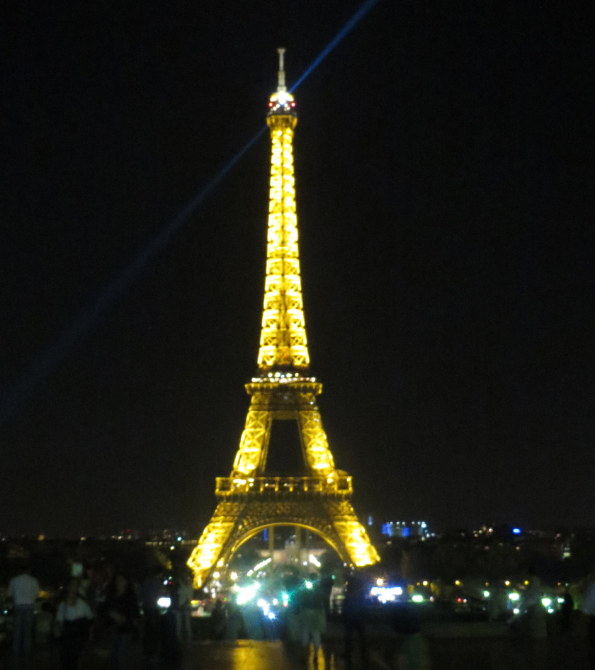 Eiffel Tower beaming at night