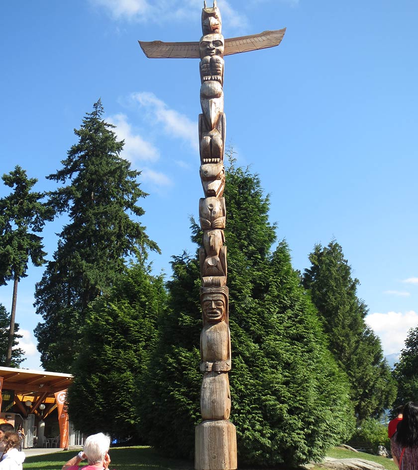 Totem Pole in Stanley Park in Vancouver Canada. Photo to inspire you to visit Vancouver.