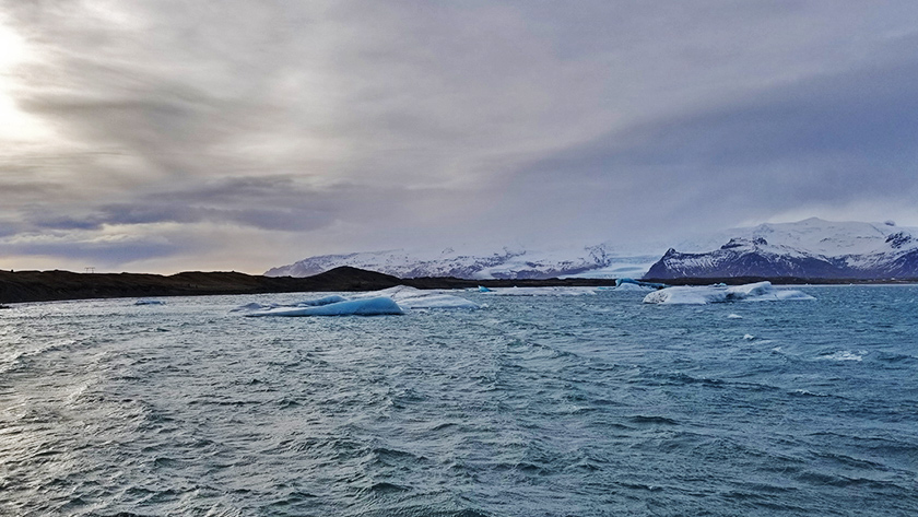 Remarkable icebergs and glaciers on a cold windy day at Jokulsarlon Lagoon in Iceland